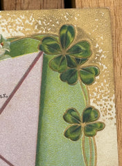 Embossed French Antique Postcard Featuring a Love Letter and a Heart of Lily of the Valley. There are Good Luck Four Leaf Clovers Around the Border, UNSIGNED COLLECTORS CARD
